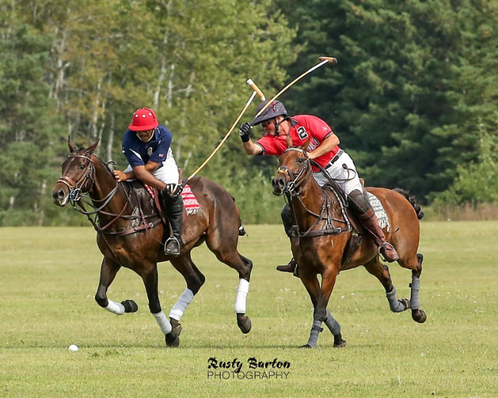 wo Riders and Their Steeds Competing in Polo